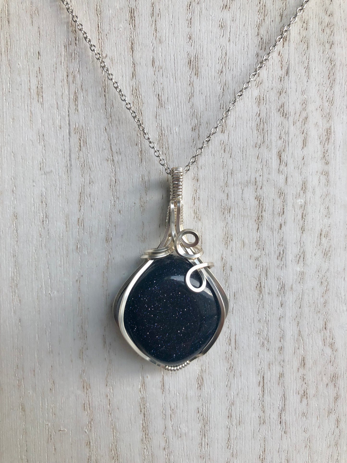 Blue Goldstone Wire Wrapped Pendant